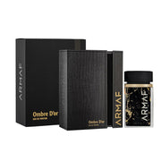 Armaf Ombre D'or 75ml EDP (inspired by Crystal Saffron) features elegant black and gold packaging with a rectangular bottle and box, offering a versatile unisex fragrance perfect for any occasion.