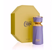 A purple and gold Paris Corner Oravea EDP bottle labeled "Oravea" sits next to a yellow geometric box with matching branding—an elegant 100ml unisex fragrance by Paris Corner.