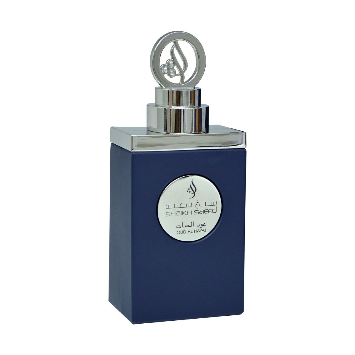 A rectangular dark blue Shaikh Saeed Oud Al Hayat 100ml Eau De Parfum bottle features a silver cap and a round front emblem, highlighting the signature scent by Shaikh Saeed.