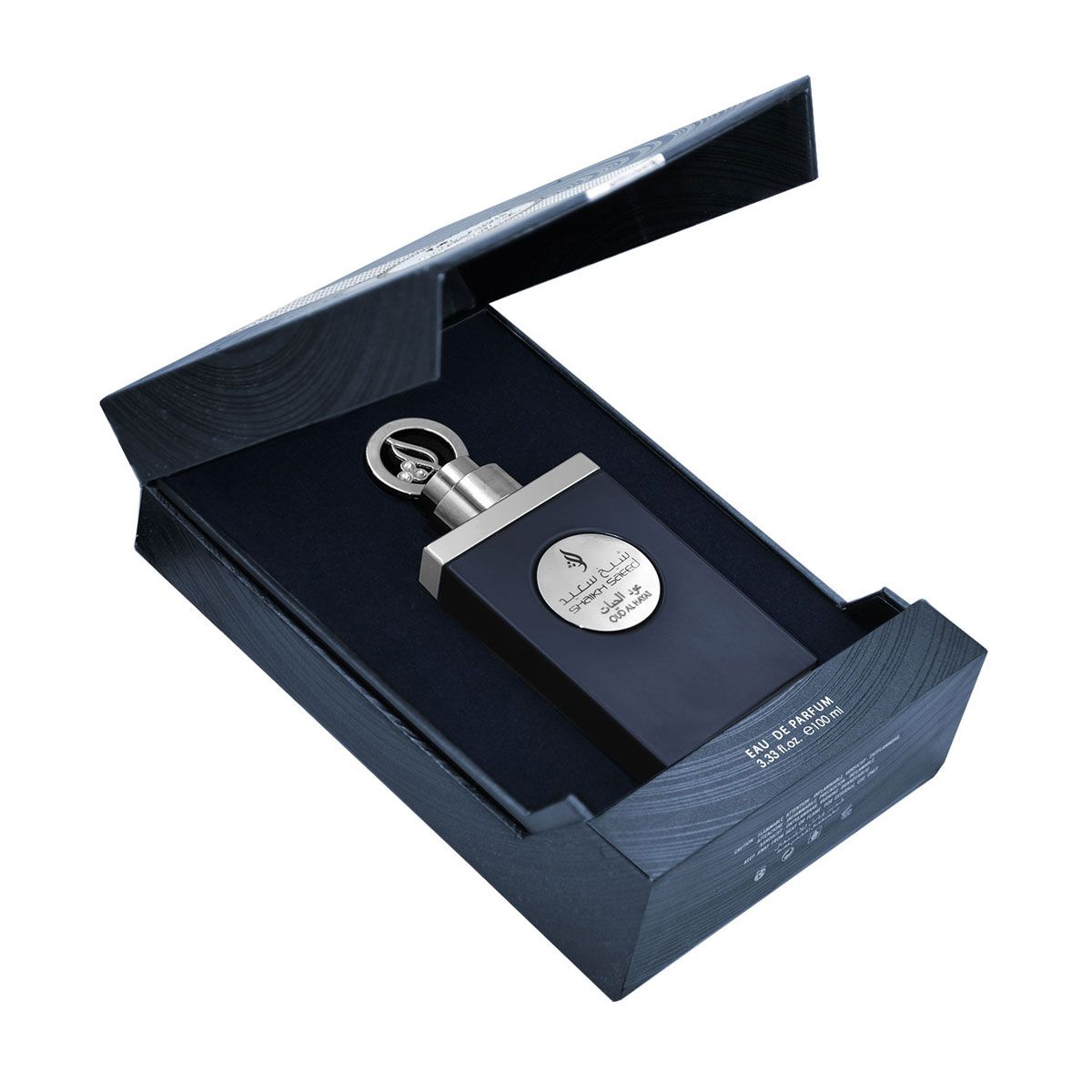 A black perfume bottle with a silver cap, featuring Shaikh Saeed Oud Al Hayat 100ml Eau De Parfum, is elegantly displayed inside an open black box with a matching interior.