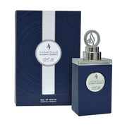 A dark blue perfume box and matching bottle with silver accents, labeled "Shaikh Saeed Oud Al Hayat 100ml Eau De Parfum" by Shaikh Saeed, displayed side by side—a refined oud fragrance for sophisticated tastes.