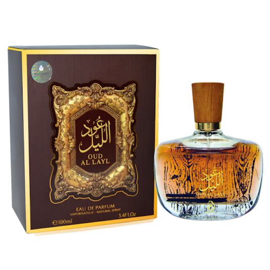 A bottle of Rio Perfumes Oud Al Layl Arabiyat 100ml Eau De Parfum next to its elegant, dark brown packaging box with ornate golden designs and Arabic script.