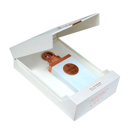Open white box containing a neatly packaged Lattafa Shaik Saeed Oud Malala 100ml Eau De Parfum with a copper-colored seal.
