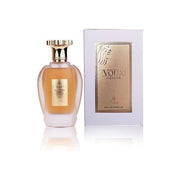 A 100ml glass bottle of Emir Voux Elegante by Paris Corner, adorned with a gold label, stands beside a coordinating white and gold box marked “VOIX ELEGANTE Eau de Parfum” on a pristine white background, capturing the sophisticated woody aromatic essence of this refined fragrance.