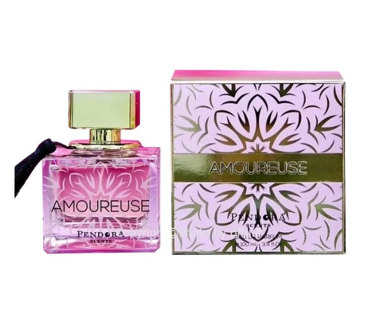 A pink bottle of Pendora Scents Amoureuse 100ml EDP is displayed beside its matching decorative box with gold accents, making it the perfect fragrance for women.