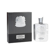 A bottle and box of Zimaya Phantom Paragon 100ml EDP by Zimaya, a men’s woody fragrance with a silver and black design and embossed emblems on both the bottle and box.
