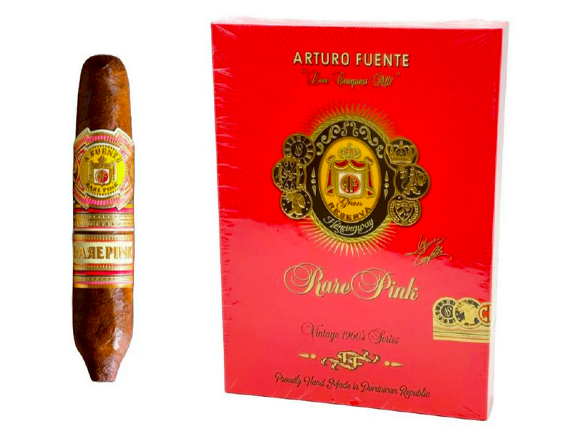 A sealed red box labeled "Rare Pink" with gold and pink accents holds a 5 pack of Signature Rare Pink cigars by Arturo Fuente, part of the brand’s limited edition collection.