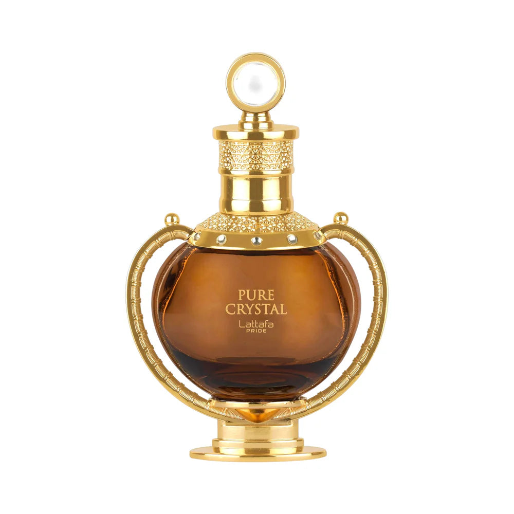 The Lattafa Pride Pure Crystal 100ml EDP by Lattafa stands upright against a white background, featuring an amber bottle with ornate gold detailing and a round stopper—a stunning unisex fragrance.