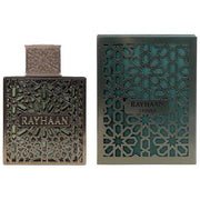 A bottle and box of Rayhaan Terra 100ml EDP by Rayhaan, both featuring intricate geometric patterns and metallic accents, capture the allure of this powerful oriental spicy fragrance.