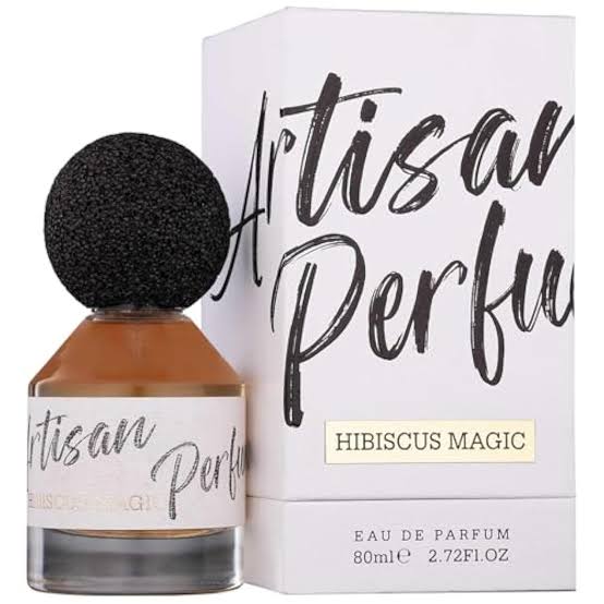 A bottle of Fragrance World Hibiscus Magic 80ml Eau De Parfum sits beside its matching box, both featuring sleek black and white text.
