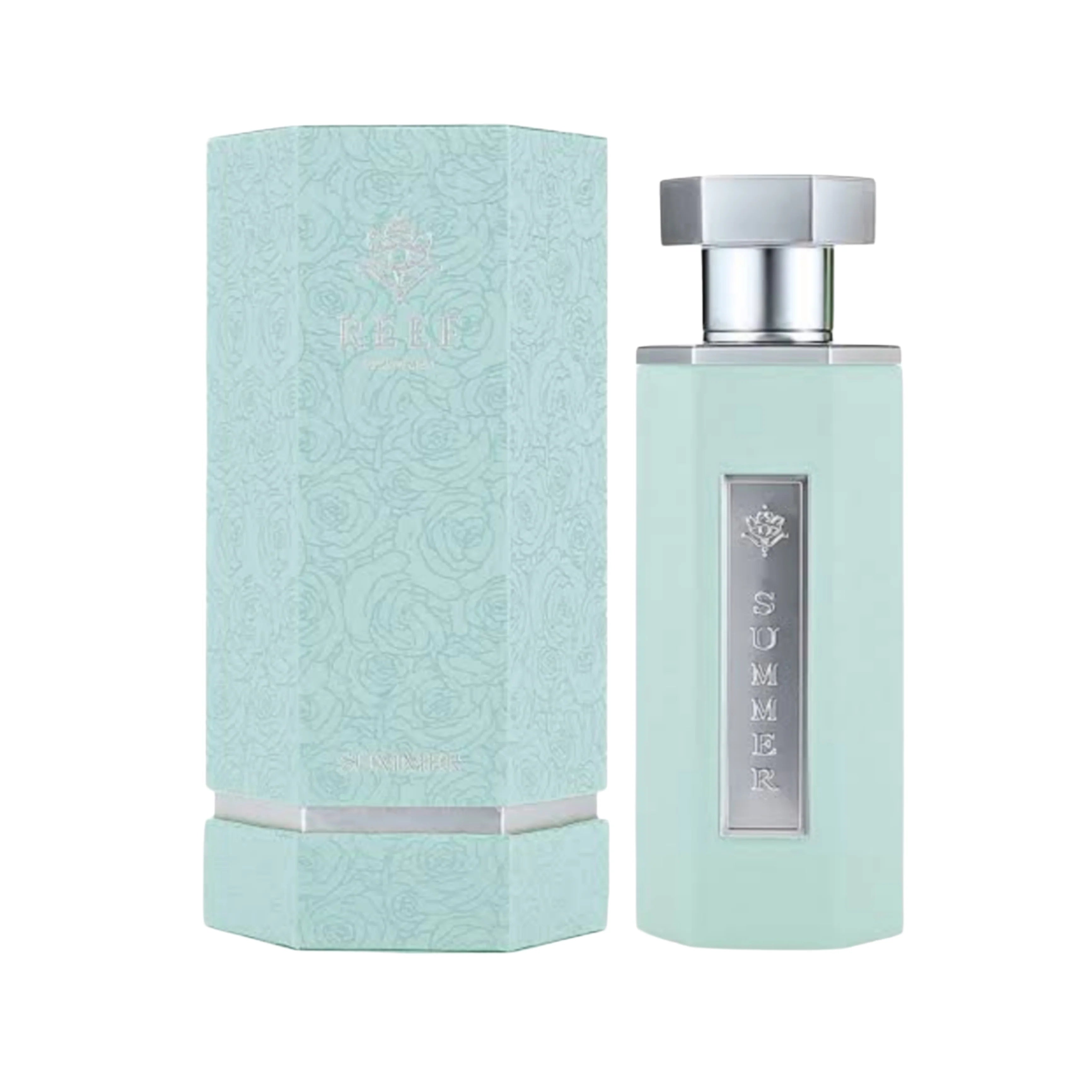A pale mint green Reef Summer 100ml EDP bottle labeled "Summer" stands beside its matching hexagonal box with a subtle floral pattern and silver accents—a refreshing summer fragrance from Reef.
