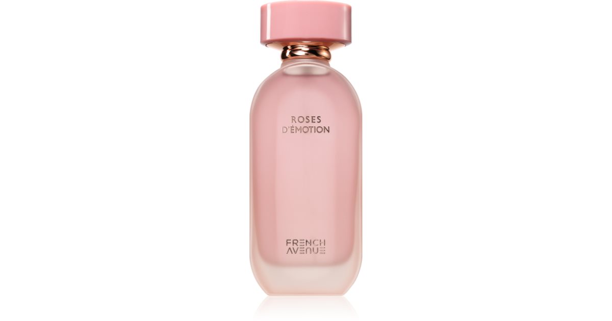 A pink bottle of Fragrance World Roses D’emotion 100ml EDP with a round cap and minimalistic labeling rests on a white background, reflecting the signature elegance of the Fragrance World brand.