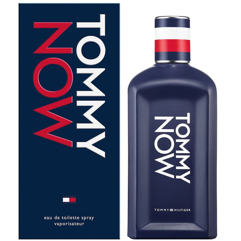 A 100ml bottle of Tommy Hilfiger Now EDT for men is displayed beside its matching box, featuring bold white and red branding that highlights the fresh, modern style of this fragrance.