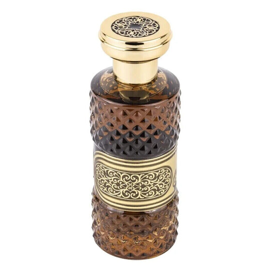 A bottle of Ard Al Zaafaran Tafakhar 100ml Eau De Parfum with a luxurious gold design by Ard Al Zaafaran.