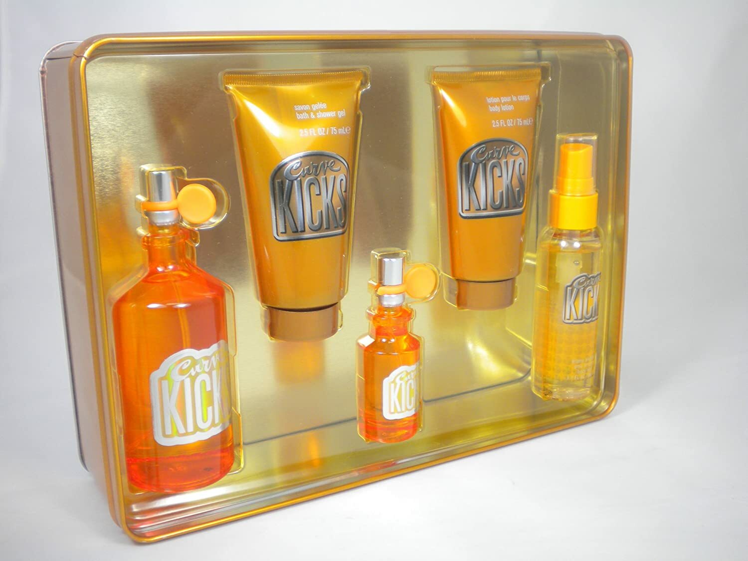 The Liz Claiborne Curve Kicks 100ml Eau De Toilette Set features two lotions, two EDT bottles, and one spray in a bold orange and gold package—a vibrant women’s fragrance gift set from Liz Claiborne.