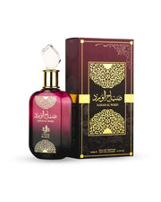 A maroon perfume bottle with a gold label and decorative cap is displayed beside its coordinating gold and maroon box labeled “Sabah Al Ward.” Al Wataniah Sabah Al Ward 100ml EDP by Al Wataniah is an exquisite Oriental floral Eau De Parfum for women, blending elegance and alluring sophistication.