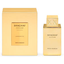 A gold rectangular box and matching bottle labeled "Swiss Arabian Shaghaf Oud Elixir EDP" are displayed side by side.
