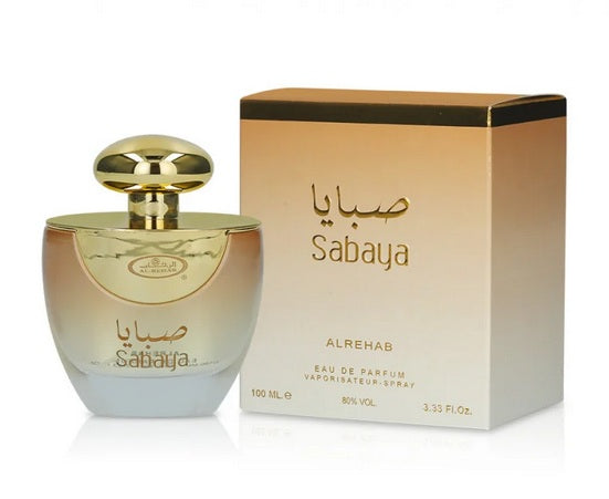 The AlRehab Sabaya 100ml Eau De Parfum bottle is displayed beside its matching box, both with gold accents and Arabic and English text—a versatile fragrance for men and women.