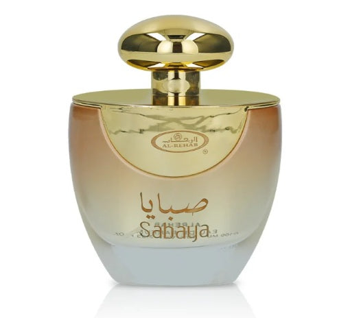 The AlRehab Sabaya 100ml Eau De Parfum features a gold cap and dual-language labeling, offering a delightful unisex fragrance from the AlRehab brand.
