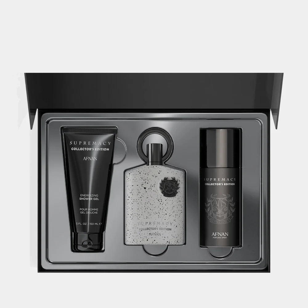 Experience the Afnan Supremacy Collectors Edition 100ml EDP Gift Set: this deluxe set by Afnan showcases a striking speckled Eau de Parfum bottle, a richly scented shower gel, and a matching deodorant spray, all presented together in an elegant black tray.