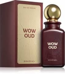 A 100ml bottle of khadlaj Wow Oud EDP, a bold men’s fragrance, is displayed beside its matching maroon and gold box.