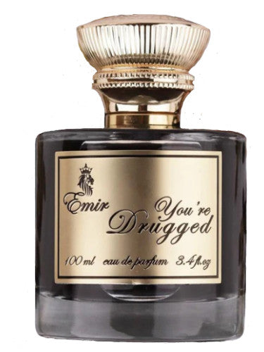 A black perfume bottle featuring a gold cap and label showcases the text "Emir You're Drugged, 100ml Eau De Parfum." This aromatic spicy scent by Emir leaves an unforgettable allure with hints of cinnamon and whiskey.