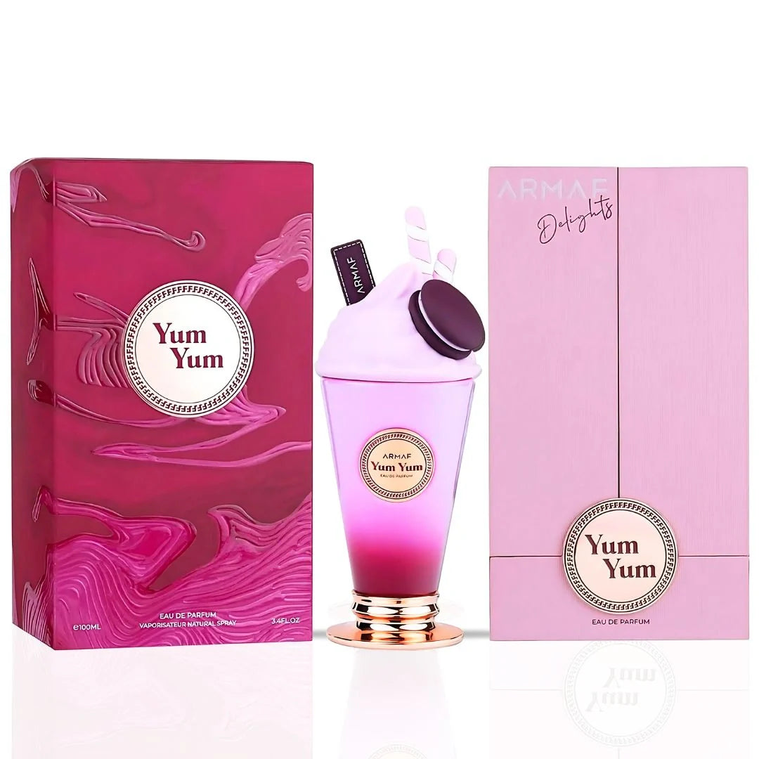 Armaf Delights Yum Yum 100ml EDP features a playful pink box and a purple-to-pink ombré bottle shaped like a milkshake, both branded Armaf—an enticing fragrance for women with matching packaging.