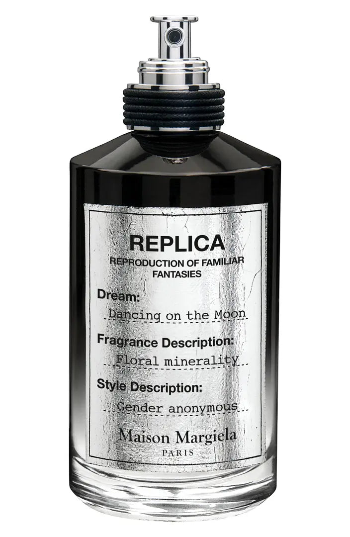 Load image into Gallery viewer, A bottle of Maison Martin Margiela Replica Dancing On The Moon fragrance on a white background.
