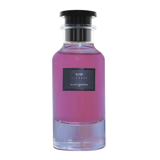 A bottle of Reyane Tradition Rose Altesse 85ml EDP scented with grapefruit and bergamote, displayed on a white background.