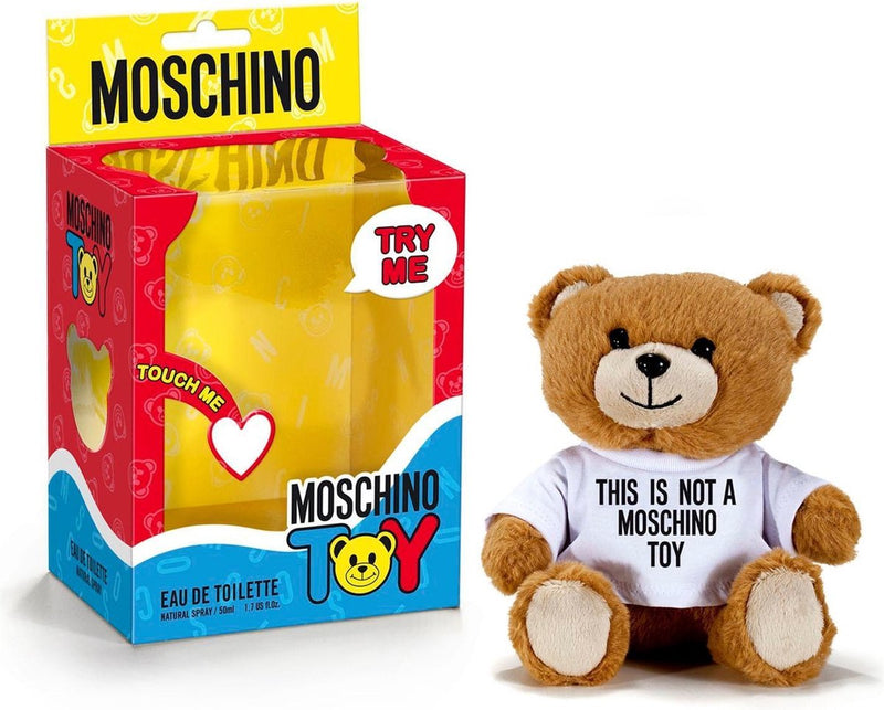 Load image into Gallery viewer, A Moschino Toy Unisex Bear 50ml Eau De Toilette teddy bear in a box with an Eau de Toilette fragrance.
