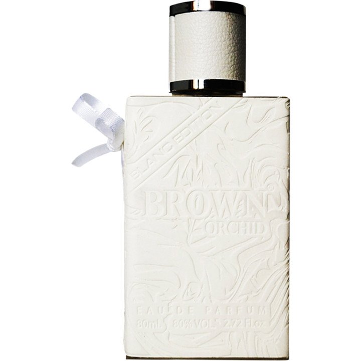 Load image into Gallery viewer, A white Fragrance World Brown Orchid Blanc Edition 80ml Eau De Parfum bottle with a bow on it.
