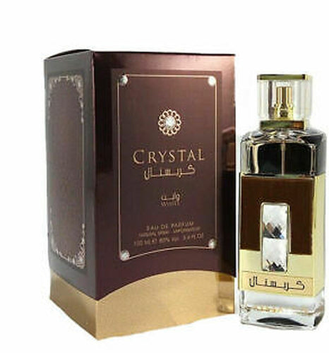 A box with a bottle of Ard Al Zaafaran Crystal White 100ml Eau De Parfum, perfect for women seeking a fragrant floral-woody scent.
