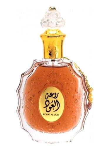Load image into Gallery viewer, A bottle of Lattafa Rouat Al Oud 100ml Eau De Parfum by Dubai Perfumes with arabic writing on it.
