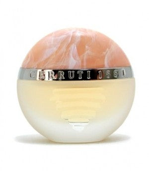 A pink and white Cerruti perfume bottle.