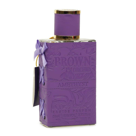 A Fragrance World Brown Orchid Amethyst 80ml Eau De Parfum bottle with a bow on it.
