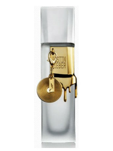 A Justin Bieber women's fragrance bottle with a gold key on it.