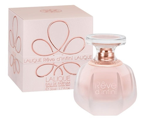 A Lalique Reve d Infini 50ml Eau De Parfum Spray bottle of la joie de chanel fragrance for women.