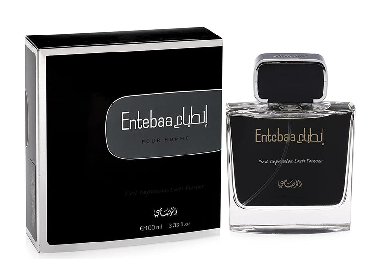 Load image into Gallery viewer, A 100ml bottle of Rasasi Entabaa For Men eau de parfum cologne elegantly placed next to a box.
