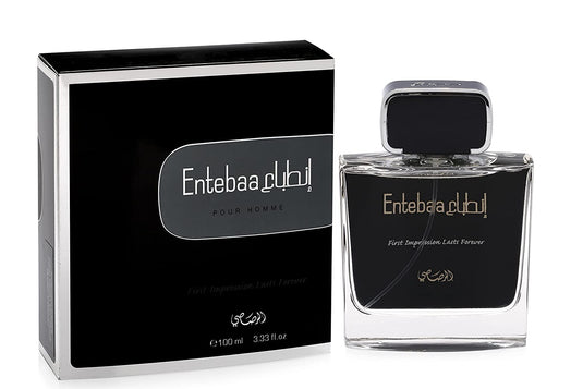 A 100ml bottle of Rasasi Entabaa For Men eau de parfum cologne elegantly placed next to a box.