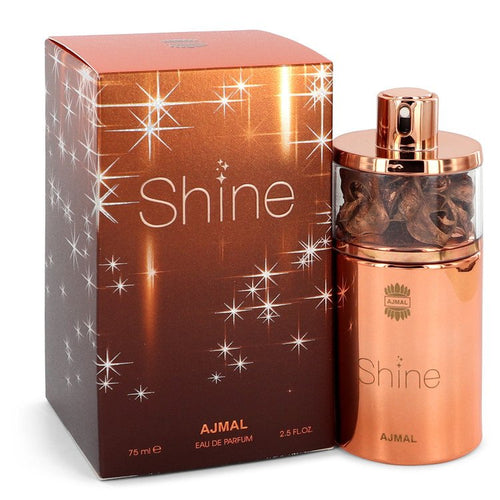 A bottle of Ajmal Shine for Him 75ml EDP perfume, accompanied by a box from Rio Perfumes.