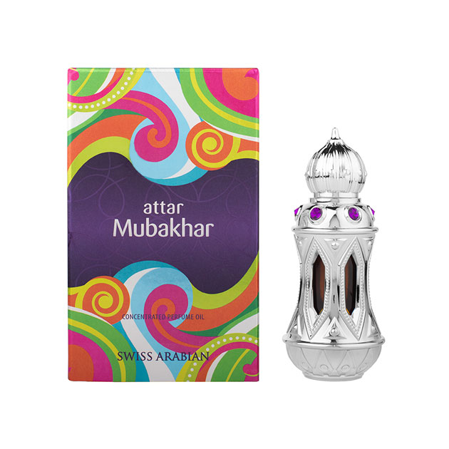 The Swiss Arabian Attar Mubakhar Concentrated Perfume Oil, a unisex fragrance, is elegantly encased in a decorative bottle and colorful box adorned with swirls and patterns.