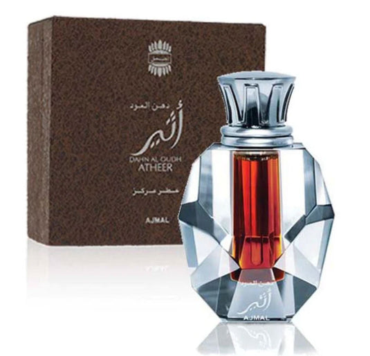 A Rio Perfumes Ajmal Dahn Al Oudh Atheer 3ml Eau De Parfum bottle with an Ajmal box in front of it.