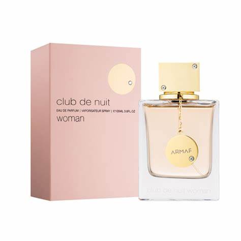 A bottle of Armaf Club de Nuit Woman 105ml Eau De Parfum in front of a box.