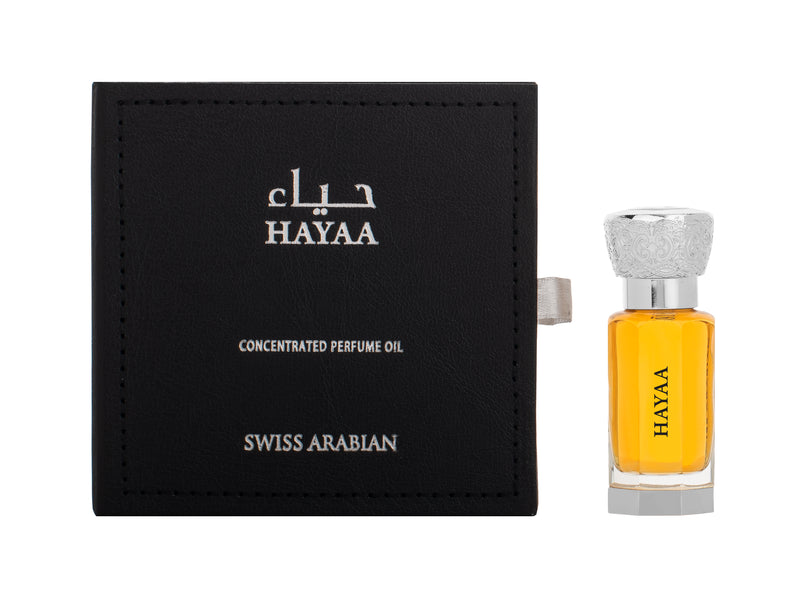 Load image into Gallery viewer, A Swiss Arabian Hayaa 12ml EDP bottle with a box.
