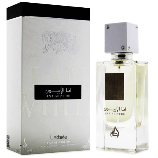 A bottle of Lattafa Ana Abiyedh 60ml Eau De Parfum by Lataffa with a box next to it.
