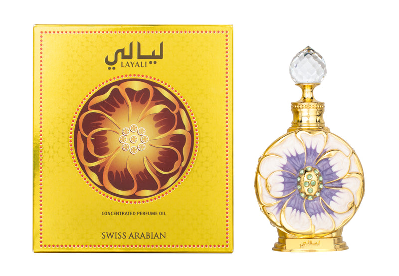 Load image into Gallery viewer, A Guess Swiss Arabian Layali 15ml Concentrated Perfume Oil bottle in front of a box.

