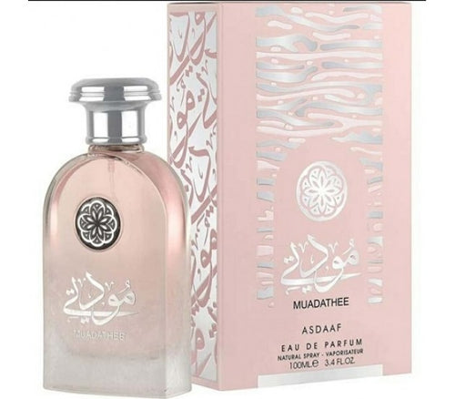 An exquisite fragrance, Asdaaf Muadathee 100ml Eau De Parfum, encased in a pink box. Perfect for Men & Women.