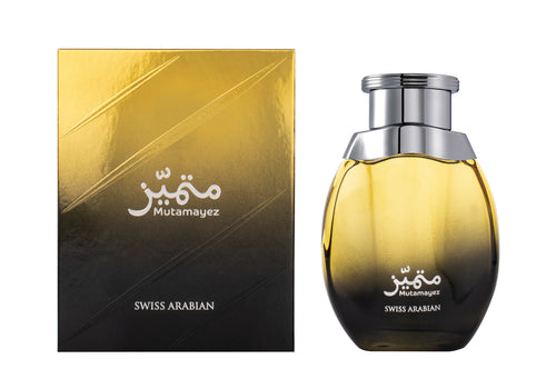 A Swiss Arabian Mutamayez 100ml Eau De Parfum bottle next to a box.