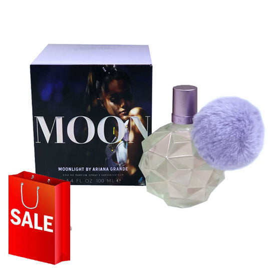 A bottle of Ariana Grande Moonlight perfume with a purple pom pom.