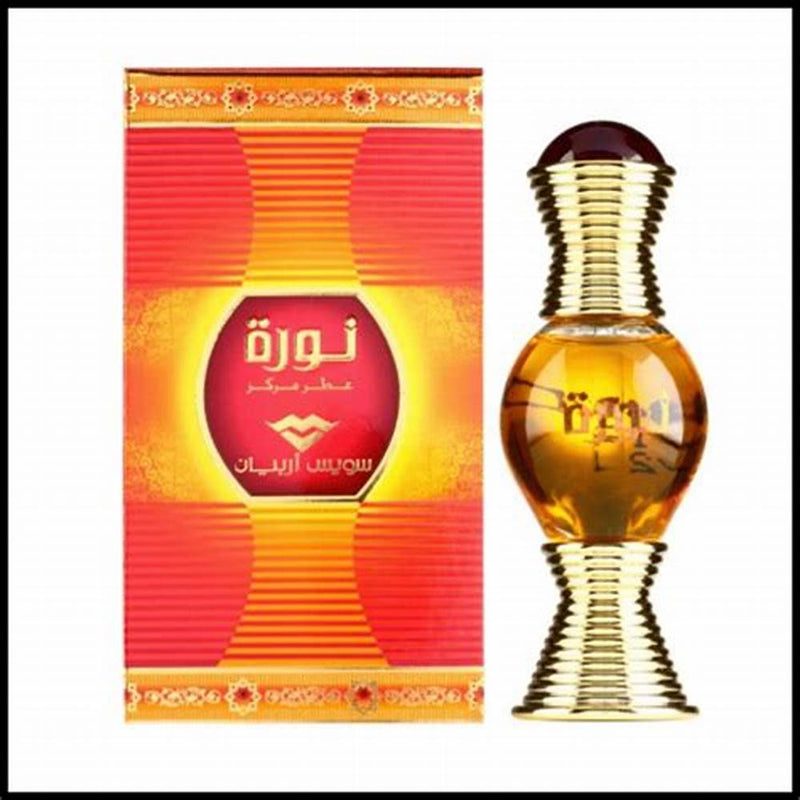 Load image into Gallery viewer, A Swiss Arabian Noora 20ml Concentrated Oil fragrance bottle in front of a box.
